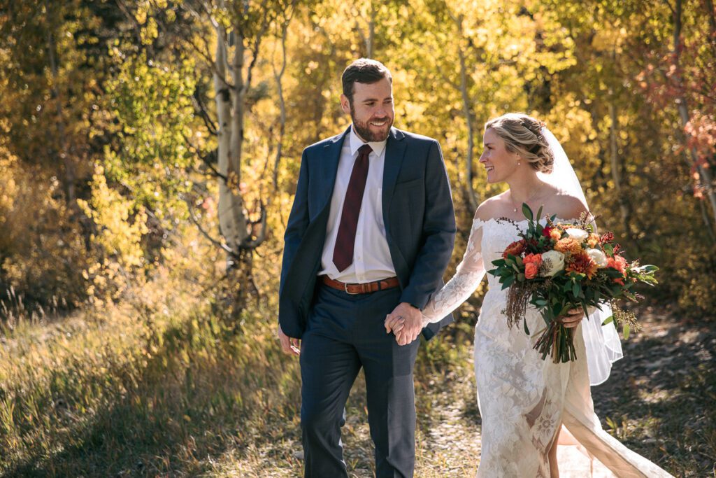 Couple walks near Sundance while captured by their Provo Wedding Photographer